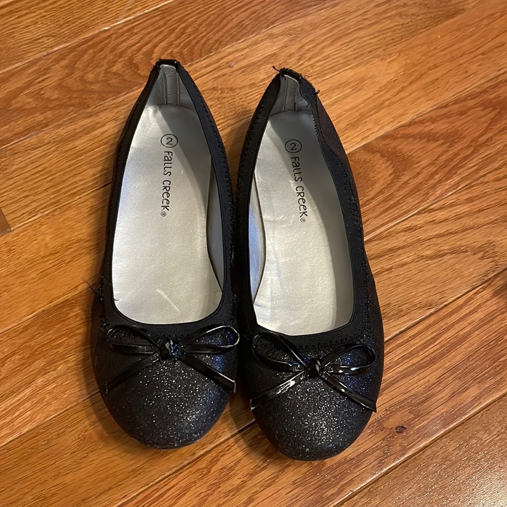 Black sparkly slip dress shoes with little bow in the front